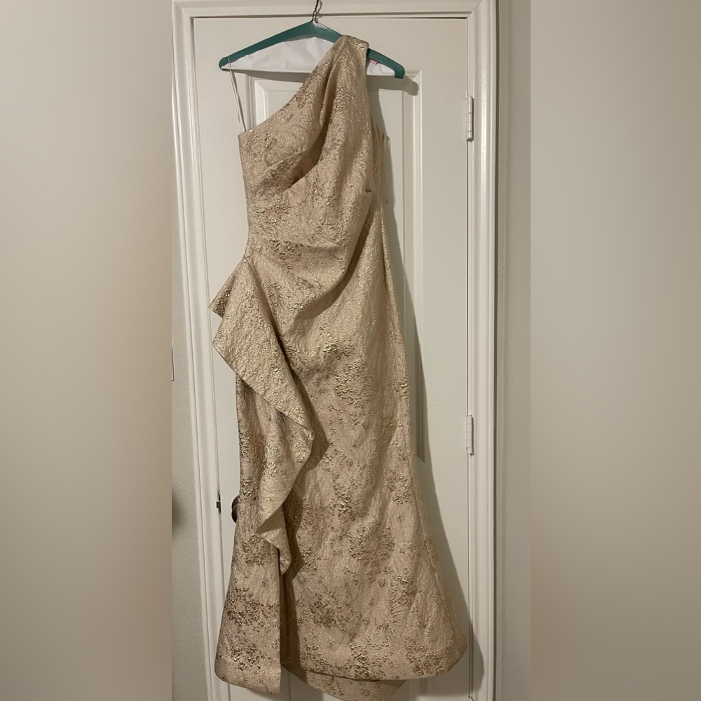 Teri Jon Metallic Jacquard One-Shoulder Gown.